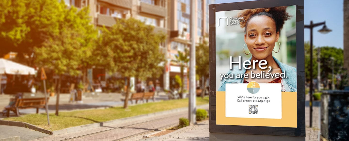 Kiosk with a Cleveland Rape Crisis Center ad